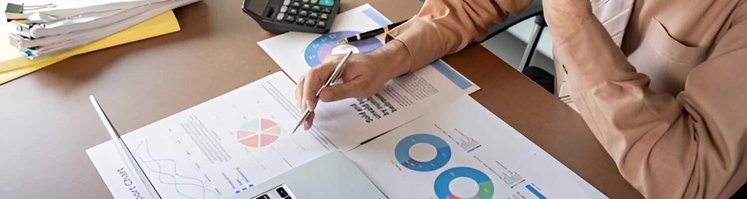 A researcher working through a printed study plan